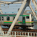 Photos: 多摩川鉄橋を通過する東海道本線E231系